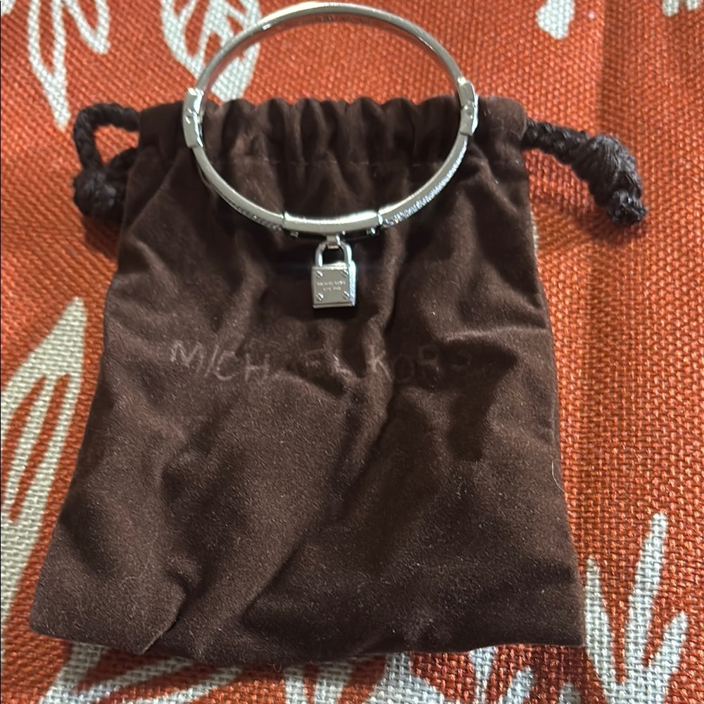 Michael Kors Silver Padlock Bangle Bracelet with Charm - NEVER WORN